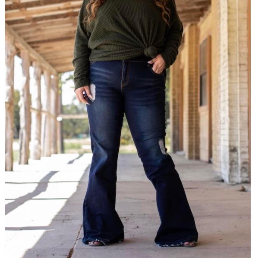 Mid rise tea stain flare jeans plus size